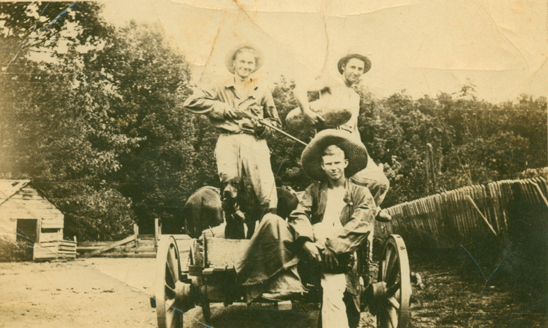 Rosco with rifle, Clavis Murley with watermelon and unknown friend in sombrero, circa 1934