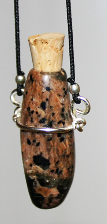 A beautiful brown and black feldspar oval aromanecklace