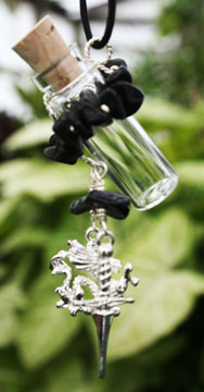 Black onyx with a chinese dragon and sword