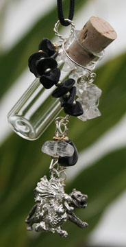 Yin and Yang - black onyx and clear quartz crytal stone chips with chinese dragon and tiger